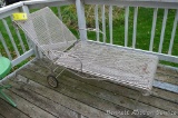 Rolling lounge chair is in pretty good condition. Measures about 62