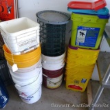 Assortment of 5 gallon pails, kitty litter pails, partial roll of chicken wire and more.