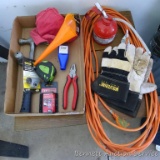 Extension cord, oil can, gloves, metal handle claw hammer, tape measure, pliers, funnel and more.