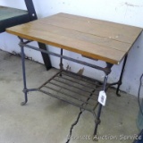 Cute little table with cast iron base measures 21