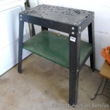 Universal metal framed base has a metal shelf; measures 25