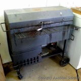 New Braunfels charcoal grill or smoker; measures 36