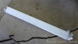 Light fixture; measures 4' long. Takes smaller bulbs.