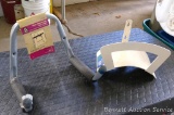 Sturdy metal wall mount hose hanger can be used for air or garden hoses; double arm hanger includes