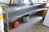 Stainless steel 2 shelf bench; measures 86