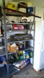 Sturdy metal shelving unit, perfect for organizing your garage or basement. Some rust spots noted on