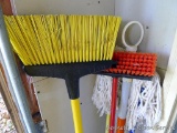 Quickie Jobsite, Libman, and other brooms, mops, marker bar, and a bucket. Tallest is 56