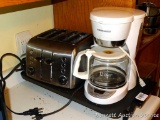 Brushed stainless Toastmaster four slice toaster, Black & Decker 12 cup coffee maker, and Presto
