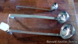 Three Polar stainless steel serving ladles. Sizes include 2 ounce, 4 ounce, and 6 ounce. Longest is