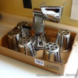 Regalware salad chopper with five attachments. Base of chopper suctions to workspace. Very heavy