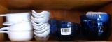 Eight matching, and one other corn cob serving dishes, plus several sets of cob picks; Five blue