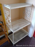 Metal shelf unit is about 21
