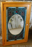 Creative mirror is framed in a wooden case 26