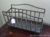 Heavy wrought metal magazine stand is 18