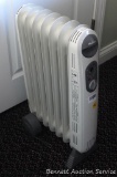 Holmes portable heater, heats. Measures about 24