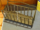 Wrought metal magazine stand is 18