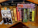DVDs and VCR tapes including Death Hunt, Hunter's Harvest, the Fall of the Roman Empire, They Call