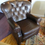 Faux leather recliner is about 38