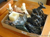 Cabin decorations including jumping deer figures are 10