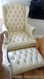 Wing back chair with ottoman. Both pieces are in overall good condition. Some slight discoloration