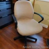 Nice rolling, adjustable height and swivel office chair.