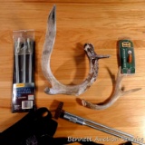 Gun slings; deer sheds; gun cleaning kit.