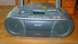 Sony CD radio/cassette player; adaptors for radio.