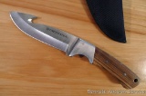 Winchester sheath knife with gut hook is 9-1/2