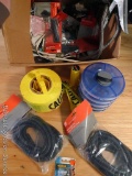 Roll of Caution ribbon, caulk gun, stacking organizer with fasteners, wire protector, cable clamps,