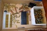 A bunch of empty brass including .45 ACP, .270 Win, .38 Special, .327 Federal Mag, 7.62x54R.