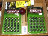 50 pieces Remington .54 caliber black powder round balls, plus a powder measure, ball starter, and