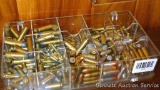 Assorted pistol and rifle cartridges including .44-40 Rem, .44 Magnum, .25 ACP, .38 Special, 9 mm