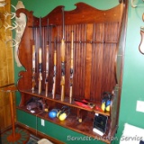 Impressive custom built wall-mounted gun rack is nearly 5' wide and is over 5' tall. Bring a