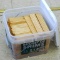Bucket of wood shims, almost full. Bucket is 10