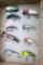 Several fishing lures, some are wooden. Longest is 4-3/4