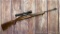 Winchester Model 100 semi-automatic rifle chambered in .308 is topped with a 3-12x40 scope in quick