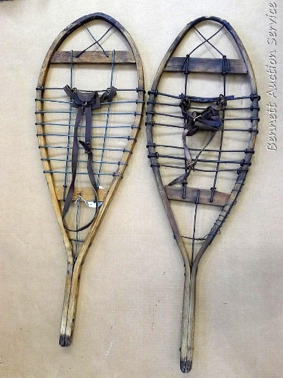 Unique vintage snowshoes may have been used for racing. Measure approx 42" x 13". Neat pieces.