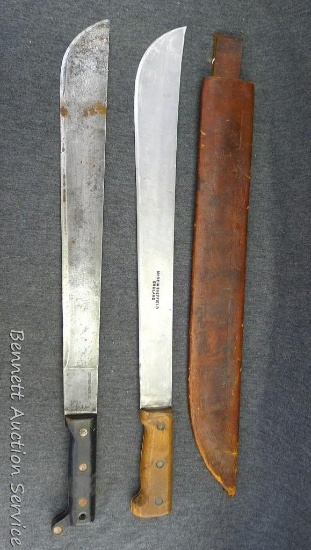 Two machete's; one blade is stamped Ontario Knife Co. U.S. and the other is stamped made in