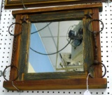 Western style framed mirror with horse bits on the sides. Frame dimensions are 18-3/4