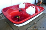 Fiji paddle boat is about 7' x 5'. Looks to be in good condition and has adjustable seats. Looks to