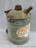 Galvanized Wheeling gas can with wooden handle. About 10
