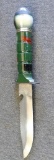 Survival knife is 11-1/4