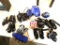 Gym bag full of Taekwondo equipment, includes chest protectors, head gear, foot and hand pads, also