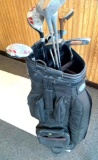 Golf Bag with assorted golf clubs; 3 putters; 2 Hybrids; 2 metal woods; one 65? Wedge; one #13
