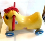 Little Tikes ride on Toy; old; has wooden handles and yarn hair; kids toys