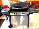 NO SHIPPING CharBroil two burner gas grille, LP tank included, electric rotisserie attachment, side