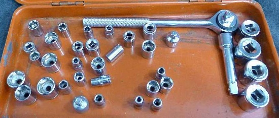 1/4" & 3/8" drive SAE and metric sockets with 3/8" drive ratchet in a metal 12" x 6" x 2" tool box.