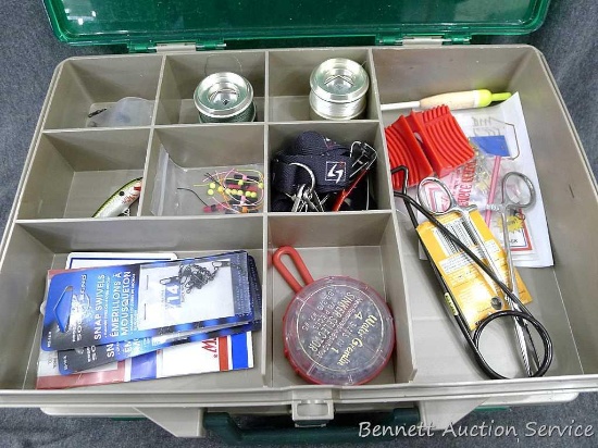 Plano double sided tackle box is 13-1/2" x 10" x 4" with hooks, sinkers, swivels, pliers and more.