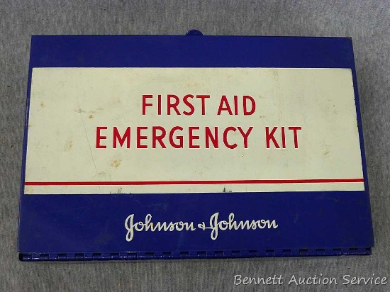 Vintage Johnson & Johnson first aid emergency kit with cardboard sleeve. Includes contents and First