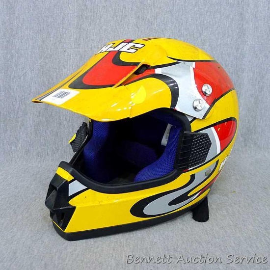 HJC CLX 2 motocross helmet is size L, 7-3/8" to 7-5/8". One piece of trim is loose and visor is